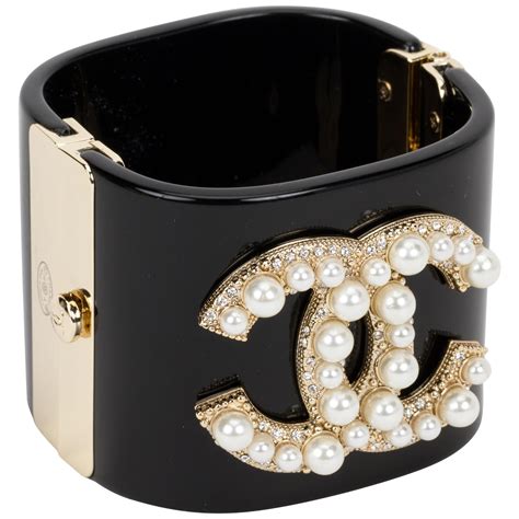 chanel black and white resin cuff|chanel button pearl bracelet.